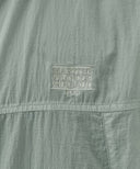 HOODED PACKABLE NYLON JACKET IN MINT GREY image 4