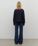 W HIGH-RISE FLARED DENIM PANTS IN BLUE image 5