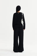 DETACHABLE SKIRT KNIT PULLOVER IN BLACK image 7