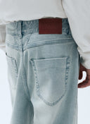 M LOW-WAIST TUCK WIDE DENIM PANTS IN LIGHT BLUE