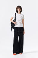LABEL DETAIL SLIM FIT TOP IN IVORY image 9