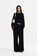 DETACHABLE SKIRT KNIT PULLOVER IN BLACK image 19