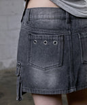 DELVE BACK LEATHER CARGO DENIM SKIRT IN BLACK