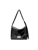 EMBOSSED LOGO LEATHER SHOULDER BAG IN BLACK