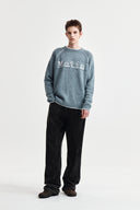 BASIC LOGO RAGLAN KNIT PULLOVER IN SMOKE BLUE