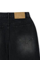 FRONT LAYERED DISTRESSED DENIM PANTS IN BLACK