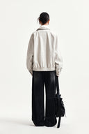FRONT LAYERED DISTRESSED DENIM PANTS IN BLACK