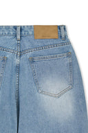 FRONT LAYERED DISTRESSED DENIM PANTS IN BLUE