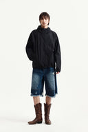 BACK LOGO HOODY WIND BREAKER IN BLACK