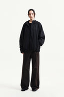 BACK LOGO HOODY WIND BREAKER IN BLACK