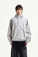 BACK LOGO HOODY WIND BREAKER IN LIGHT BEIGE
