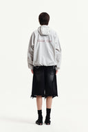 BACK LOGO HOODY WIND BREAKER IN LIGHT BEIGE