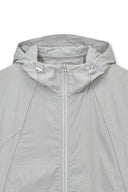 BACK LOGO HOODY WIND BREAKER IN LIGHT BEIGE
