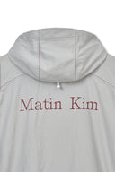 BACK LOGO HOODY WIND BREAKER IN LIGHT BEIGE