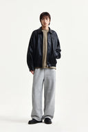 SMALL LOGO FAUX LEATHER ZIP UP JUMPER IN BLACK