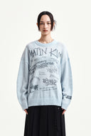 GRAFFITI ARTWORK KNIT PULLOVER IN LIGHT BLUE