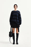 MULTI PANEL LAYERED SKIRT IN BLACK