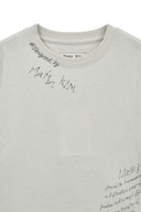 GRAFFITI ROUND HEM CROP TOP IN CREAM