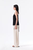 BUTTON SLEEVELESS BLOUSE IN BLACK