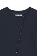ASYMMETRIC BUTTON CLOSURE TOP IN NAVY