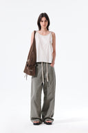 TWIST SHOULDER SLEEVELESS TOP IN CREAM