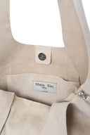 SIDE ZIP SUEDE SHOULDER BAG IN IVORY