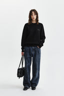 CALLIGRAPHY BACK LOGO KNIT PULLOVER IN BLACK