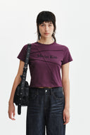 DIAGONAL CUT LOGO CROP TOP IN PURPLE