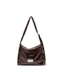 EMBOSSED LOGO LEATHER SHOULDER BAG IN BURGUNDY